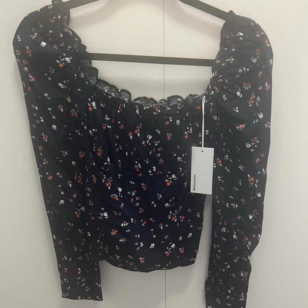 Adorable blue floral print Reformation blouse. Size 6. New with tags.